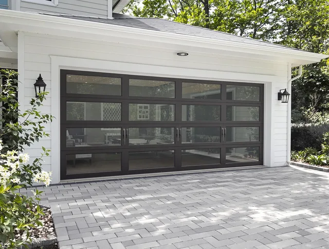Poinciana Garage Door Repair design specialist presenting custom garage door options to Poinciana homeowner